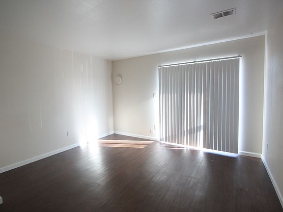 hardwood plank floors in living area