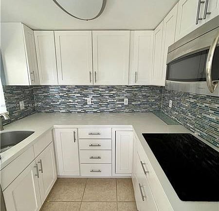 4th image of 9721 E Bay Harbor Dr #D-2b