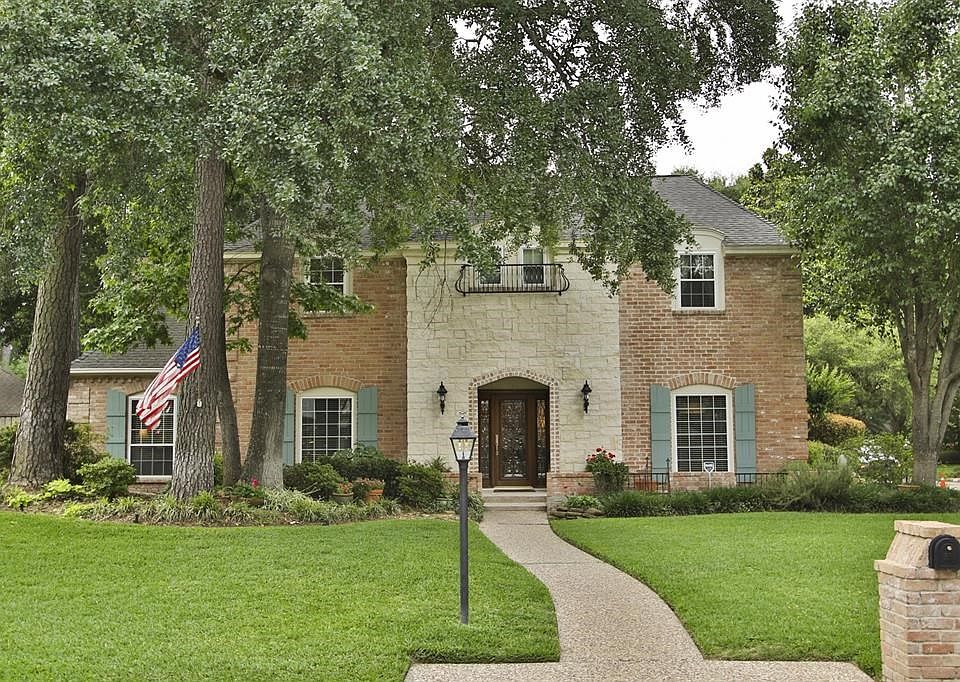 This beautiful and charming home located on a corner lot in Huntwick, with mature landscaping and trees can be your new forever home!