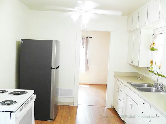 Kitchen with Brand New Refrigerator and Brand New Stove/Oven