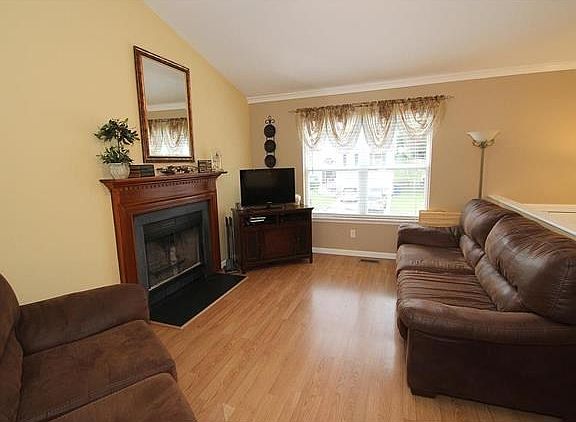 Great room with a wood-burning fireplace