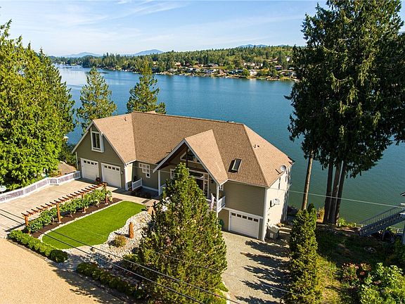 180 degree view of Big Lake. Home faces east and has over 100 feet of waterfront.