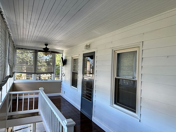 Three season porch, the second entry door leads to living room.
