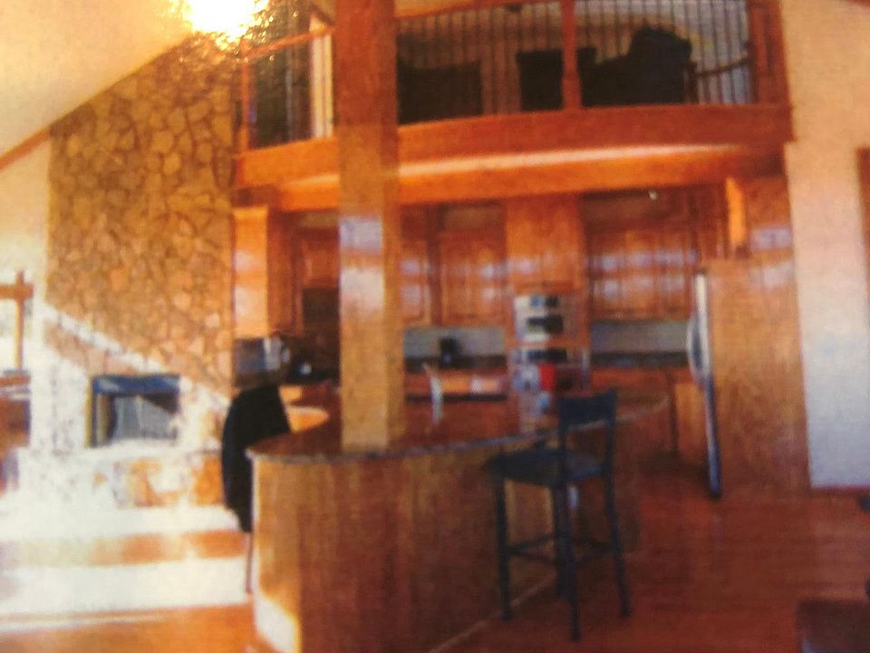 Great Room Rock Fireplace Kitchen