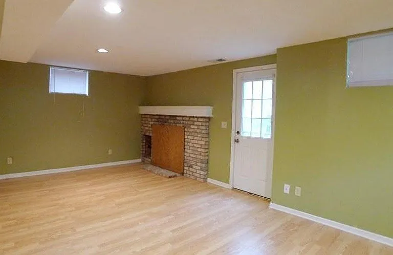 Great family room downstairs with fireplace