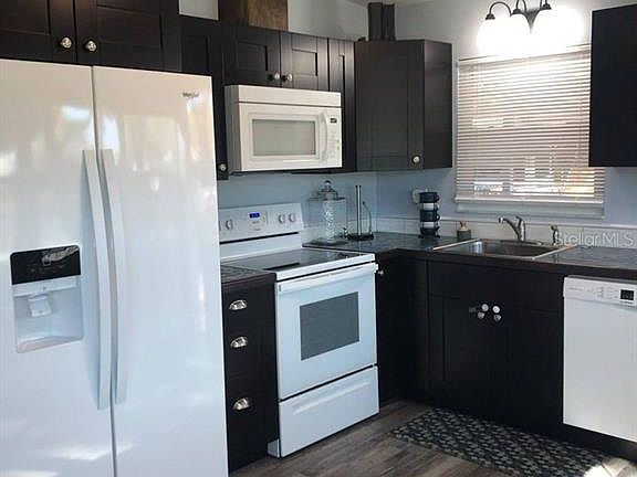 4th image of 7498 Meadowlawn Dr N
