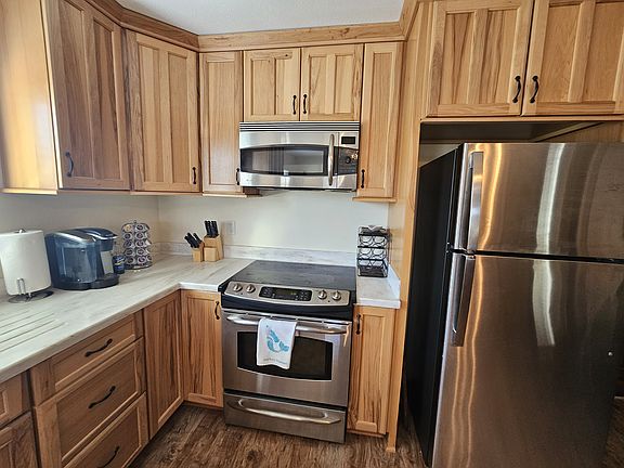 Kitchen with newer appliances and Keurig coffeemaker