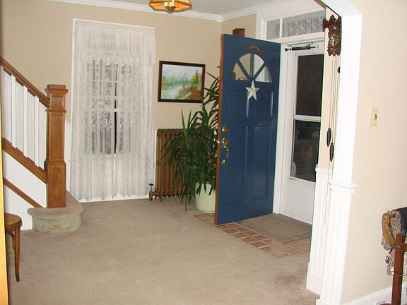 gorgeous foyer, notice neutral decor.