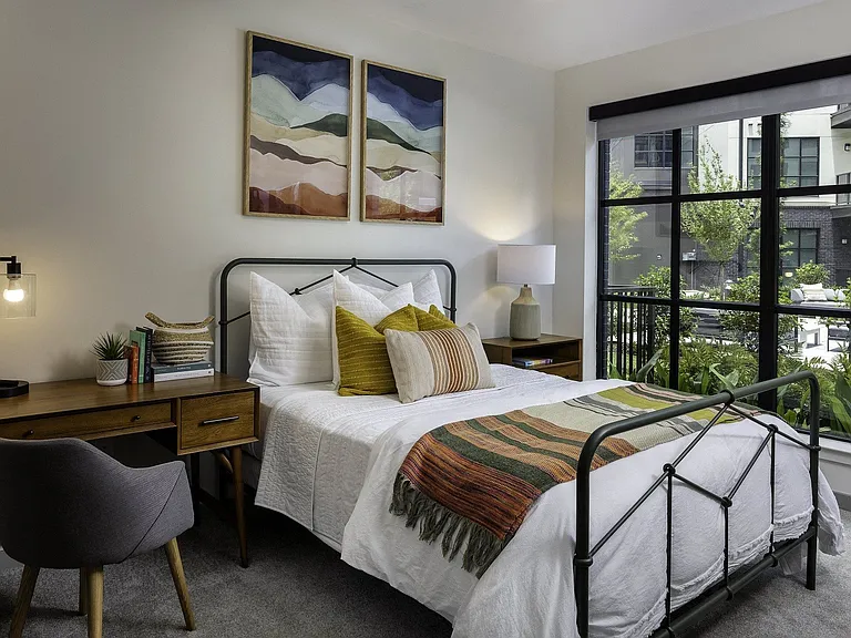 Floor-to-ceiling windows provide ample natural light.