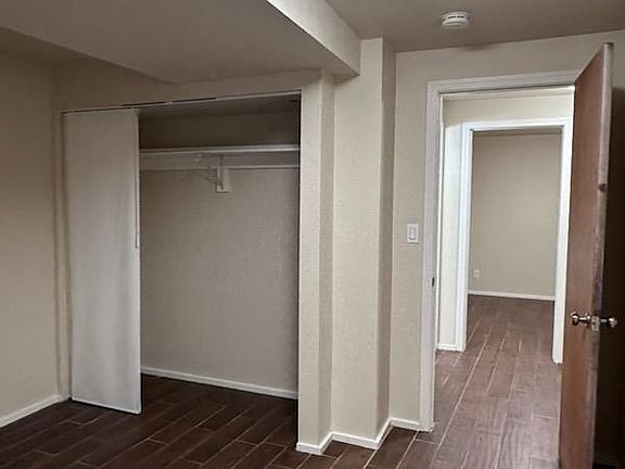 Bedroom with full sized closet