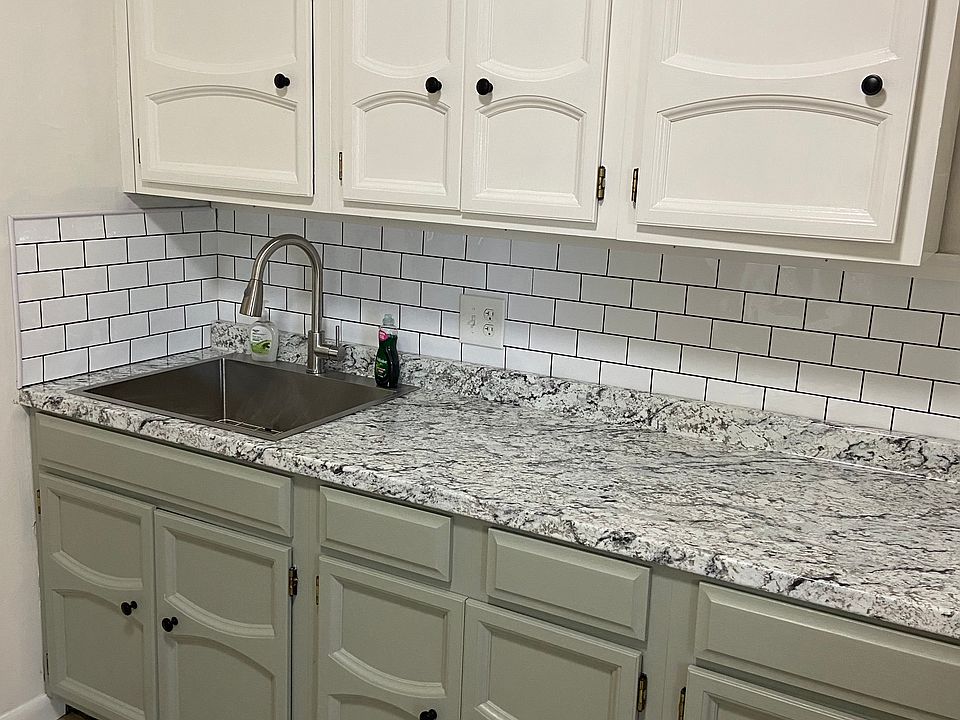Renovated kitchen with so much charm! New luxury vinyl plank flooring throughout, making for easy clean up.