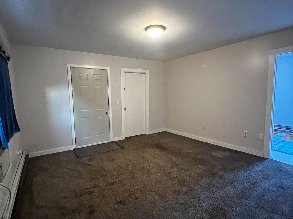 Living room facing front door and master bedroom door