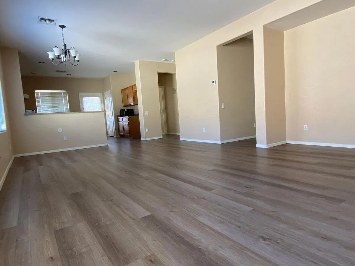 Beautiful new plank flooring in this 4 bedroom home — Photo 2