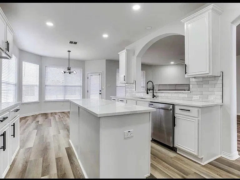Kitchen, 15' x 12', view towards breakfast nook (11' x 10') and door to backyard and patio