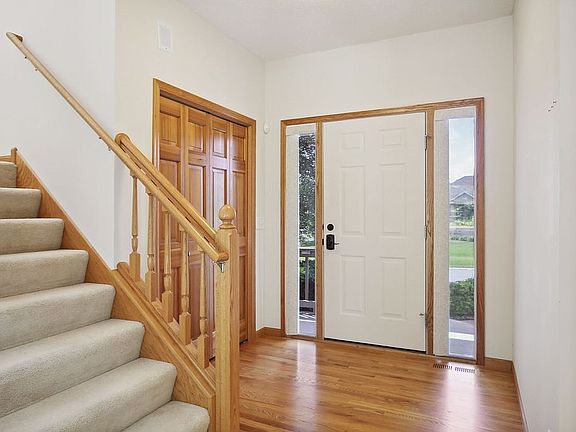 Front door and coat closet