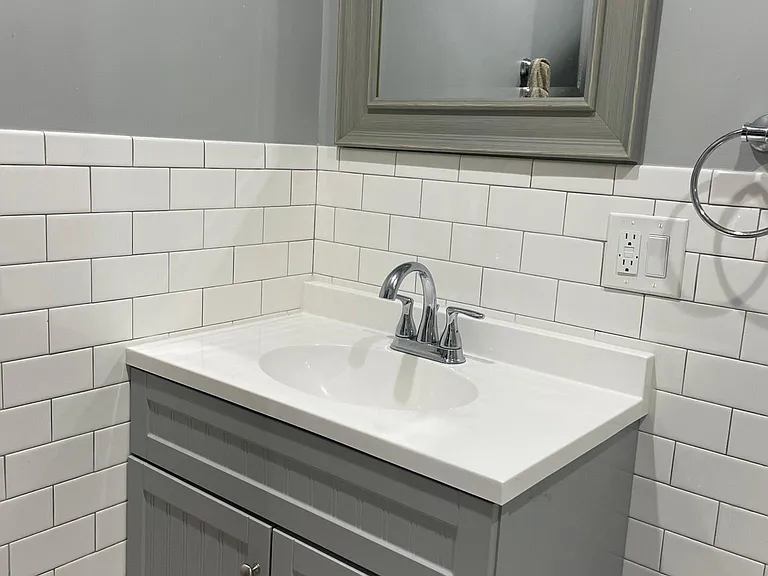 Subway tiles throughout the bathroom for a modern sleek look!