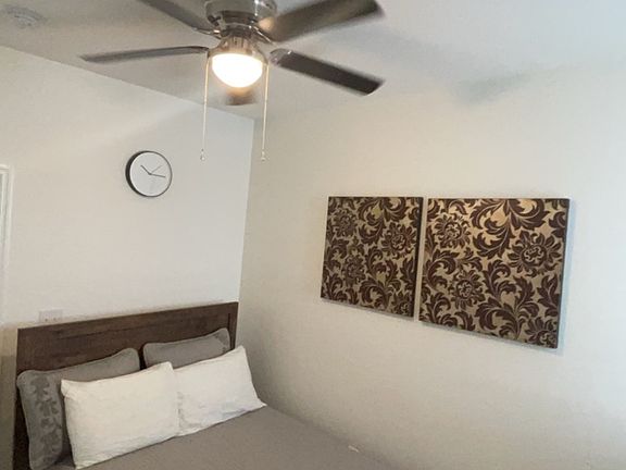 One of three Bedrooms.