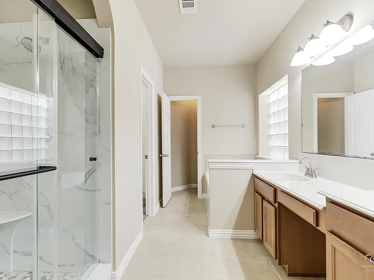 Primary bath with Updated walk-in shower.