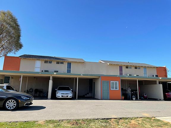 Back of Property with Car Ports