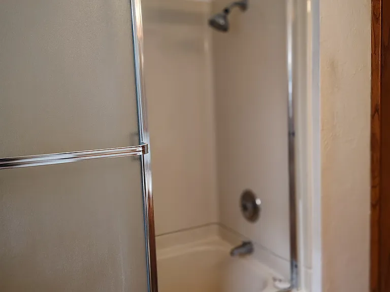 Bathroom w/ tub and shower