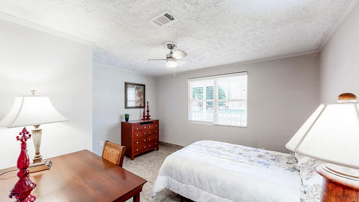 Photo 1 of 9 - Stockton Farm Rd - Pendergrass, GA Large Room with Seating - Stockton Farm Rd