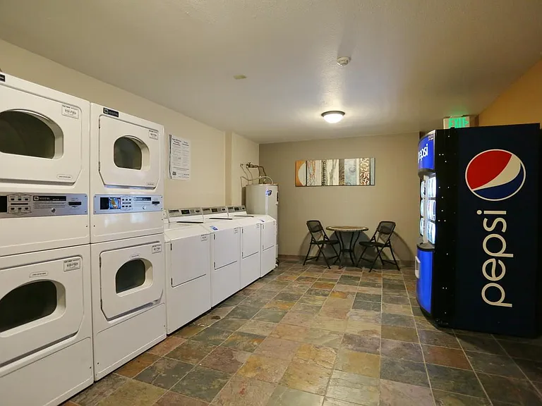 New laundry machines with convenient card readers located in each building.