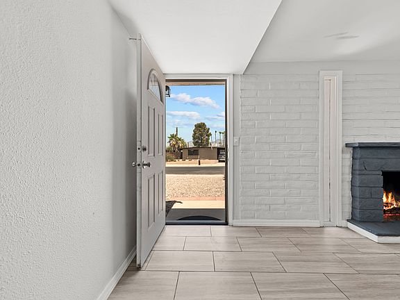 Step through the front entry into a bright, tiled foyer.