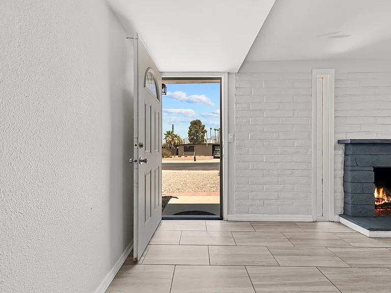Step through the front entry into a bright, tiled foyer.