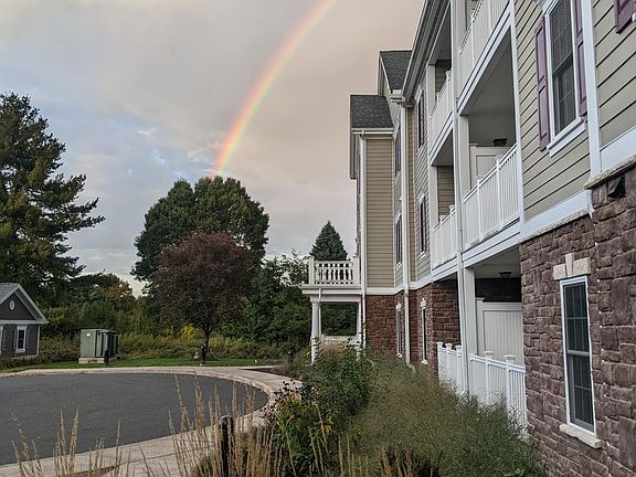 The apartment complex has two entrances with security cameras and doors that lock