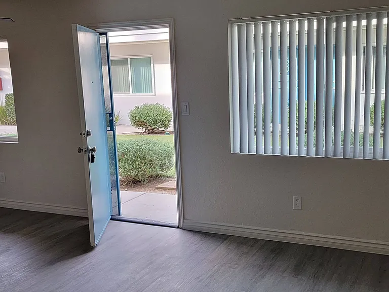 Front room and enterance at Orlando Woods Apartments in El Cajon, California.