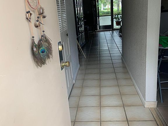 neutral colored tile flooring throughout