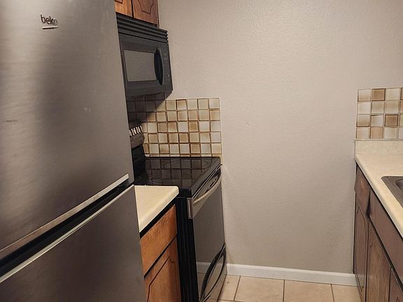3rd image of 8333 Comanche Rd NE APT 12C