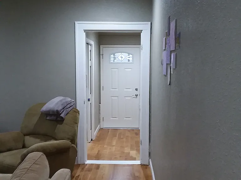 Living room, looking toward the North door.