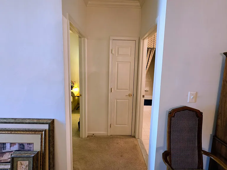 An expansive dining space filled with natural light, offering plenty of room for a large table and heirloom furniture.