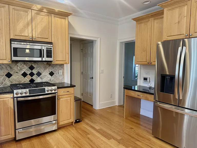 kitchen to office, powder room, and laudry room