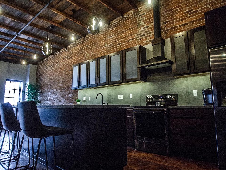 Beautifully designed spacious kitchen with black stainless appliances