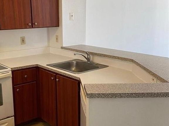 2nd image of 8550 N Sherman Cir APT 305