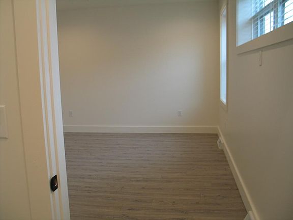 view of bedroom from bathroom