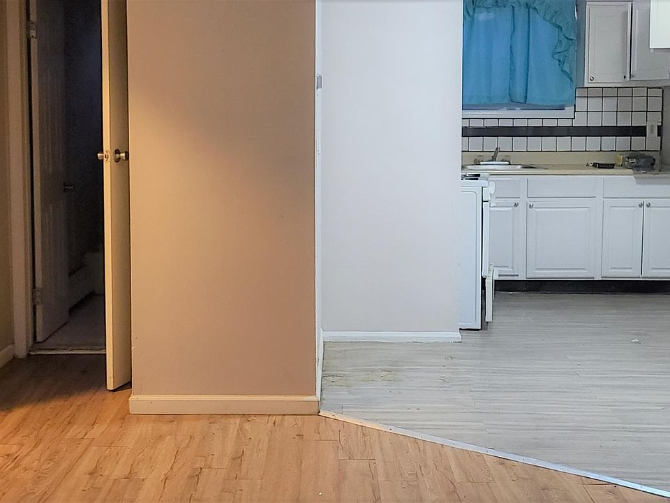Open layout with full size kitchen with big windows on 2 or 3 sides of each apartment.