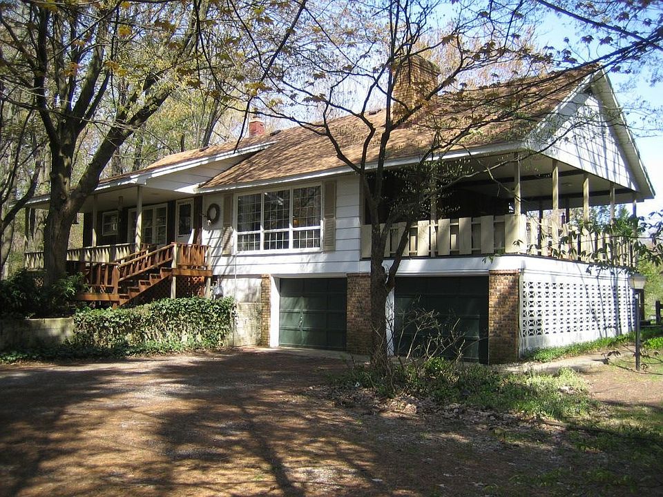 Charming home on 7 acres with 6-stall barn!