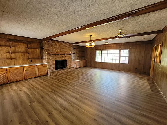 Spacious Family Room with Built in cabinets