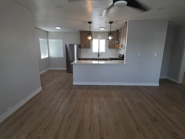 living room view into kitchen area