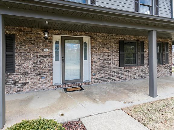 Wrap around front porch with plenty of room for seating.