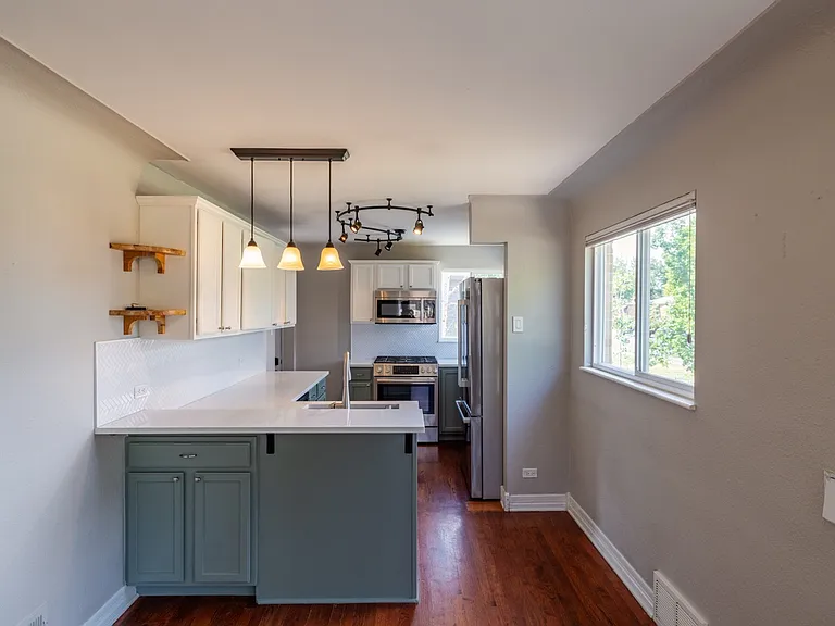 Chef's kitchen with upgraded appliances.