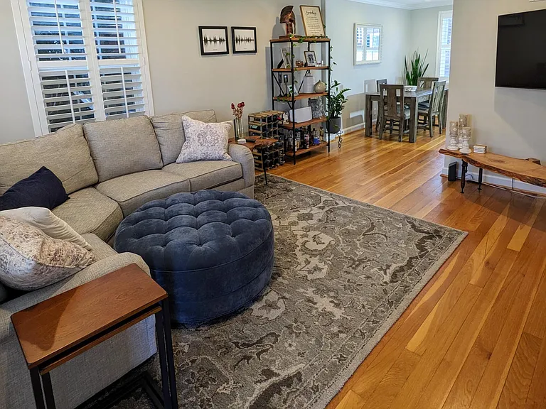 Staggered housing position allows for additional side windows (as seen in image above sofa)