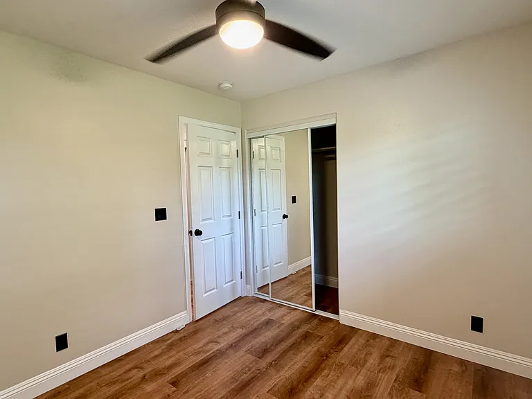 Guest room 1 looks out over side yard