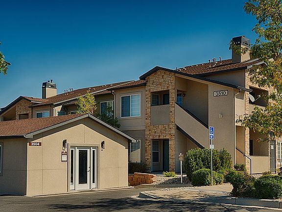 Exterior image of the property buildings. The property is Garden Style.