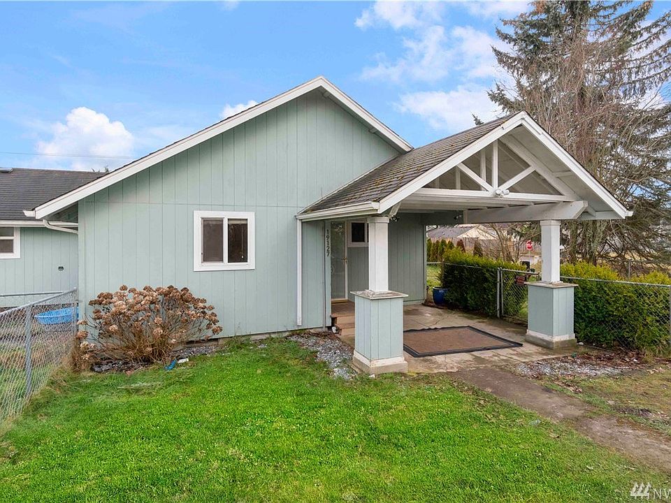 Large, covered from porch and entryway.