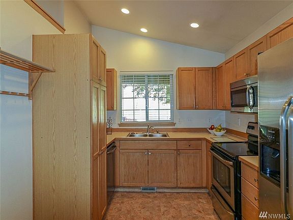 The Kitchen has Plenty of Counter and Cabinet Space. All Newer Matching Stainless Steel Appliances are Included!