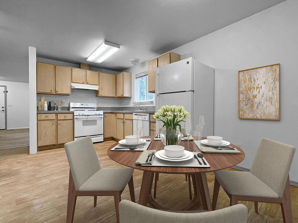 Kitchen with eating space, shown staged.